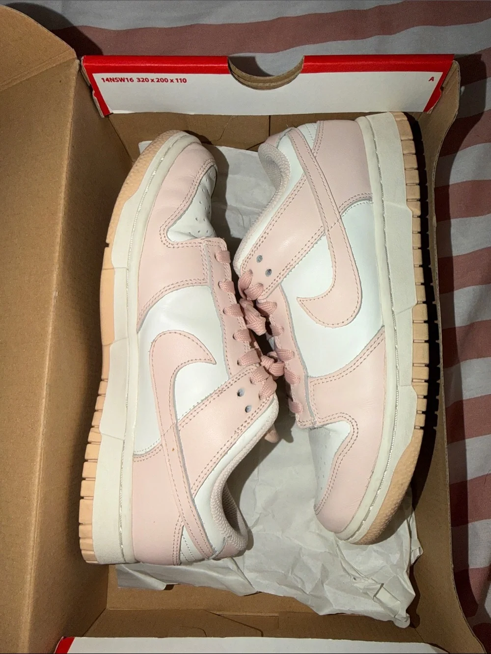 Nike Women’s Dunk Low Sneakers in Sail Orange Pearl